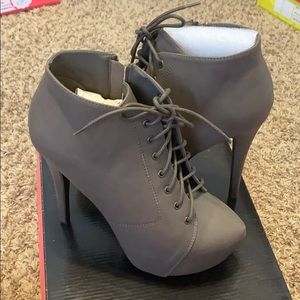 Laced high heel booties